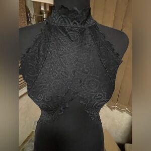 Black Fashinova Bodysuit. Lace front, sheer material, open back. Size XS.